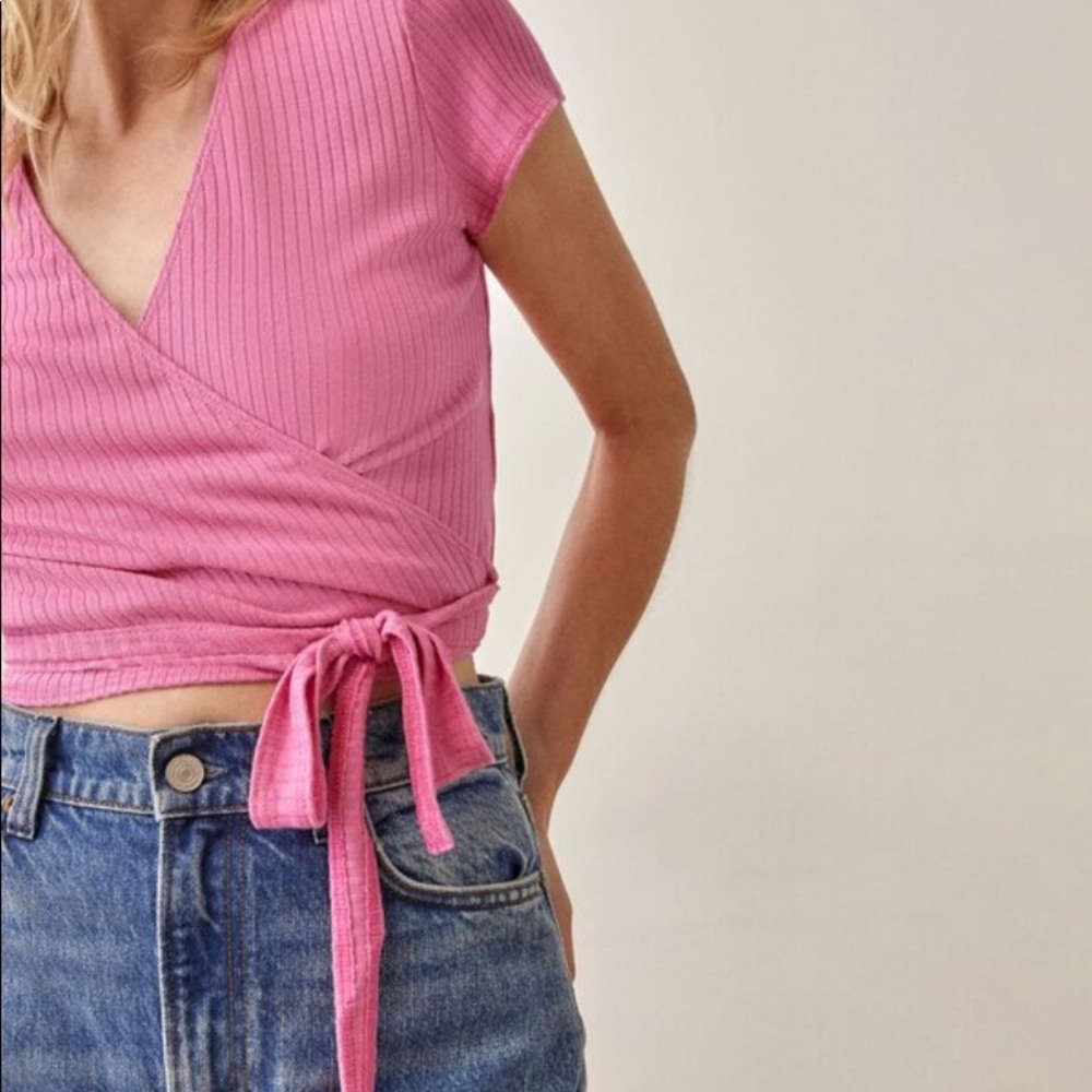 Reformation 
Flora Top 
Ribbed Hot Pink wrap top
Size small